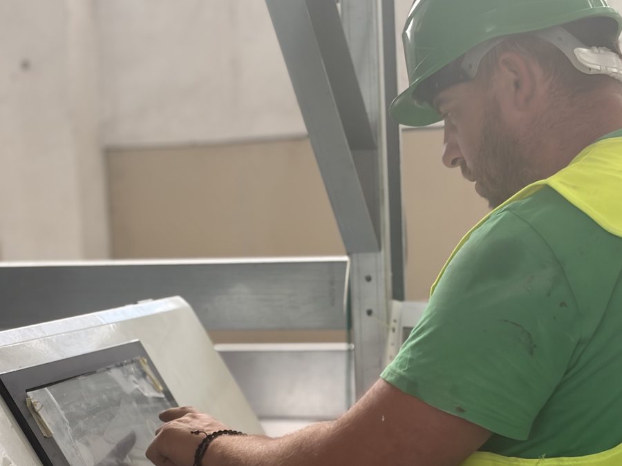 Operator at the control panel of the PET recycling line